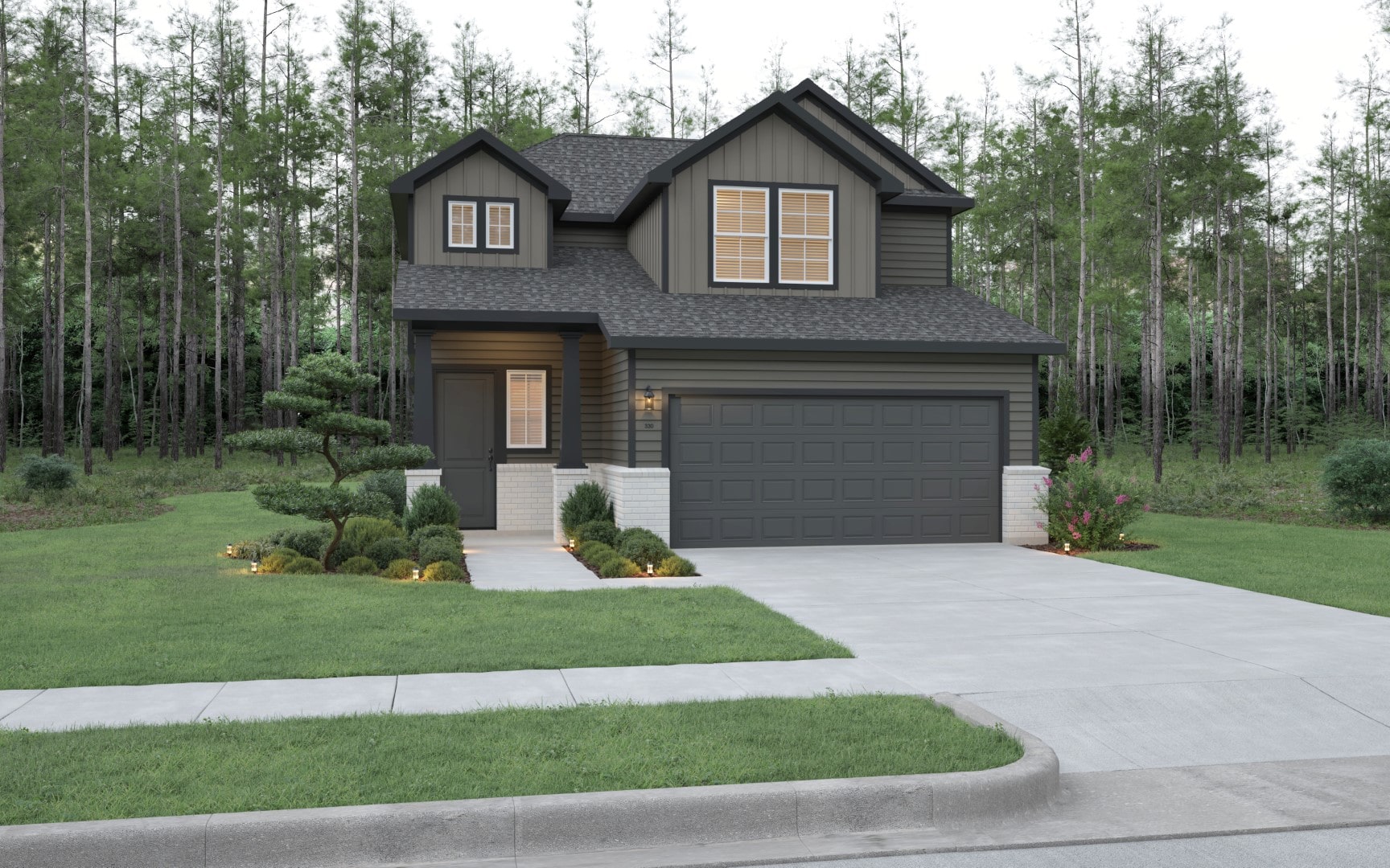 A modern two-story house with dark gray siding, a double garage, and large windows. The front yard features manicured grass, small shrubs, and a tree, with a forest in the background.