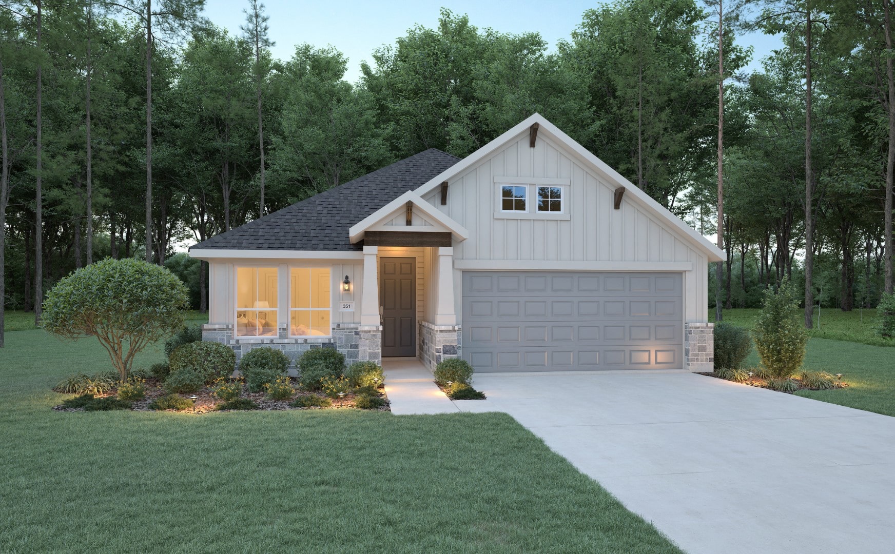 A modern single-story house with light-colored siding, a dark roof, and a two-car garage sits surrounded by trees and landscaping, with lights illuminating the front entrance and yard.