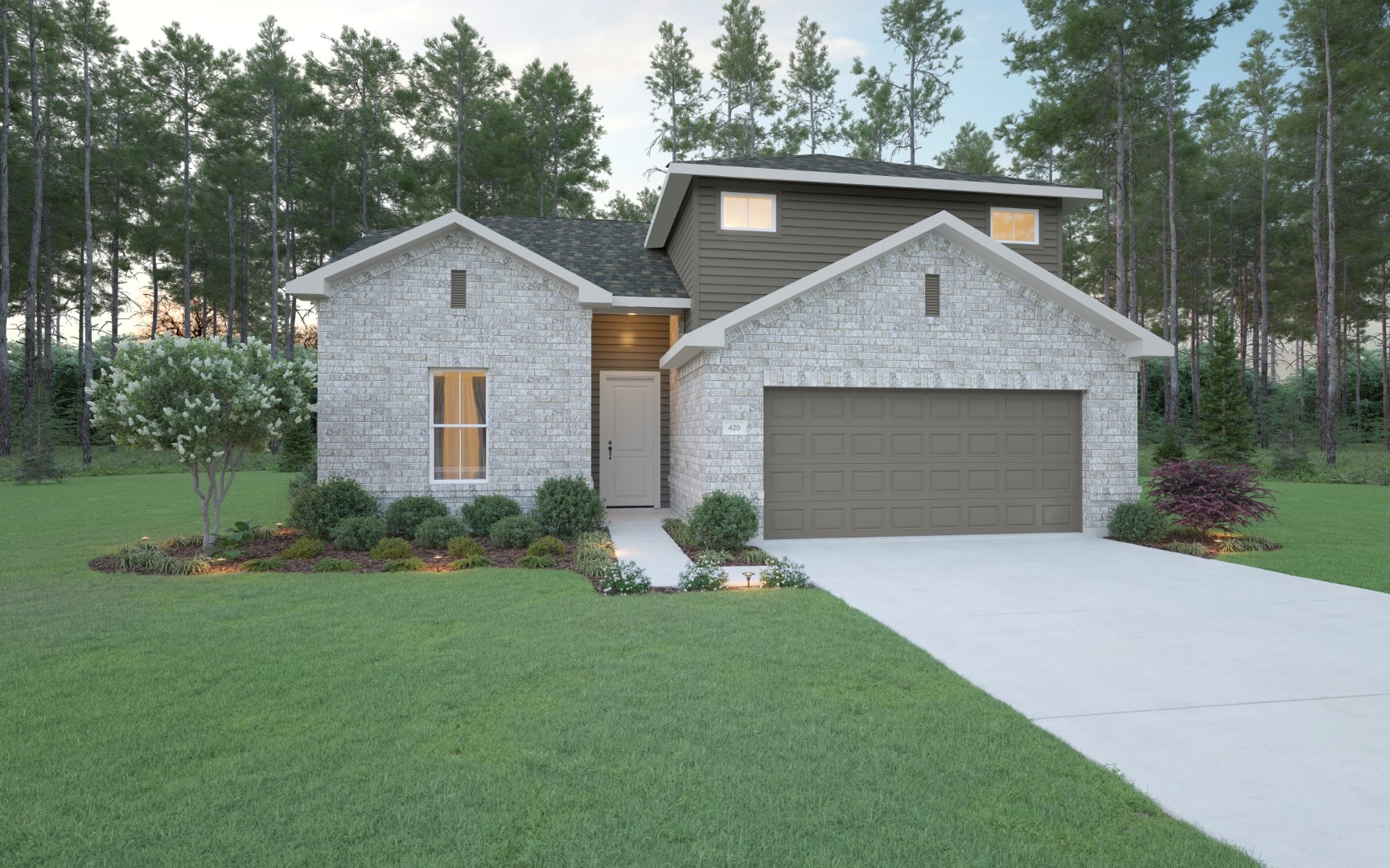 A modern two-story house with light brick exterior, double garage door, manicured shrubs, and a concrete driveway, surrounded by green lawn and tall trees in the background.