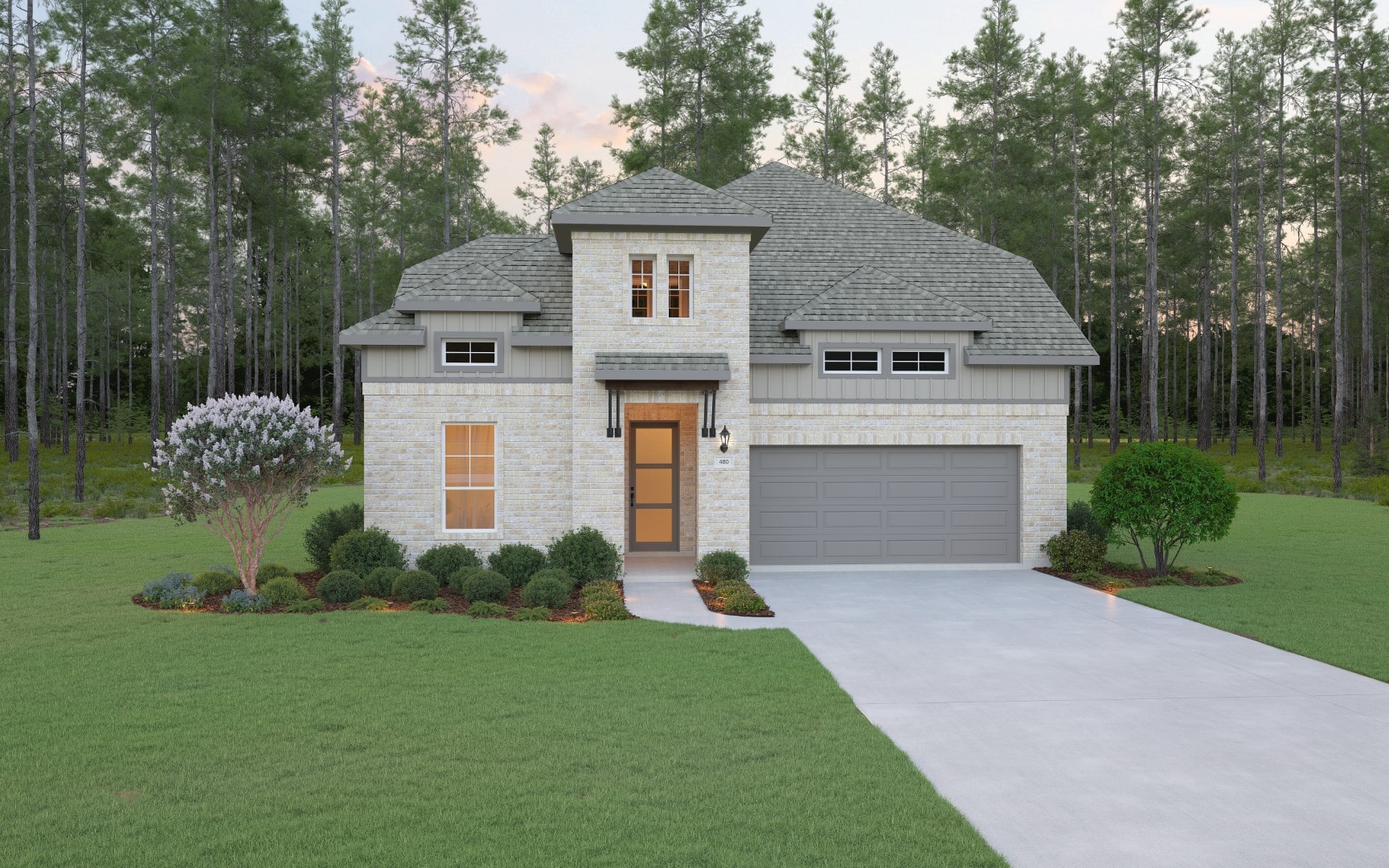 A modern two-story house with light brick exterior, gray roof, double garage, and large windows, surrounded by green grass, shrubs, and trees, with a forested background.