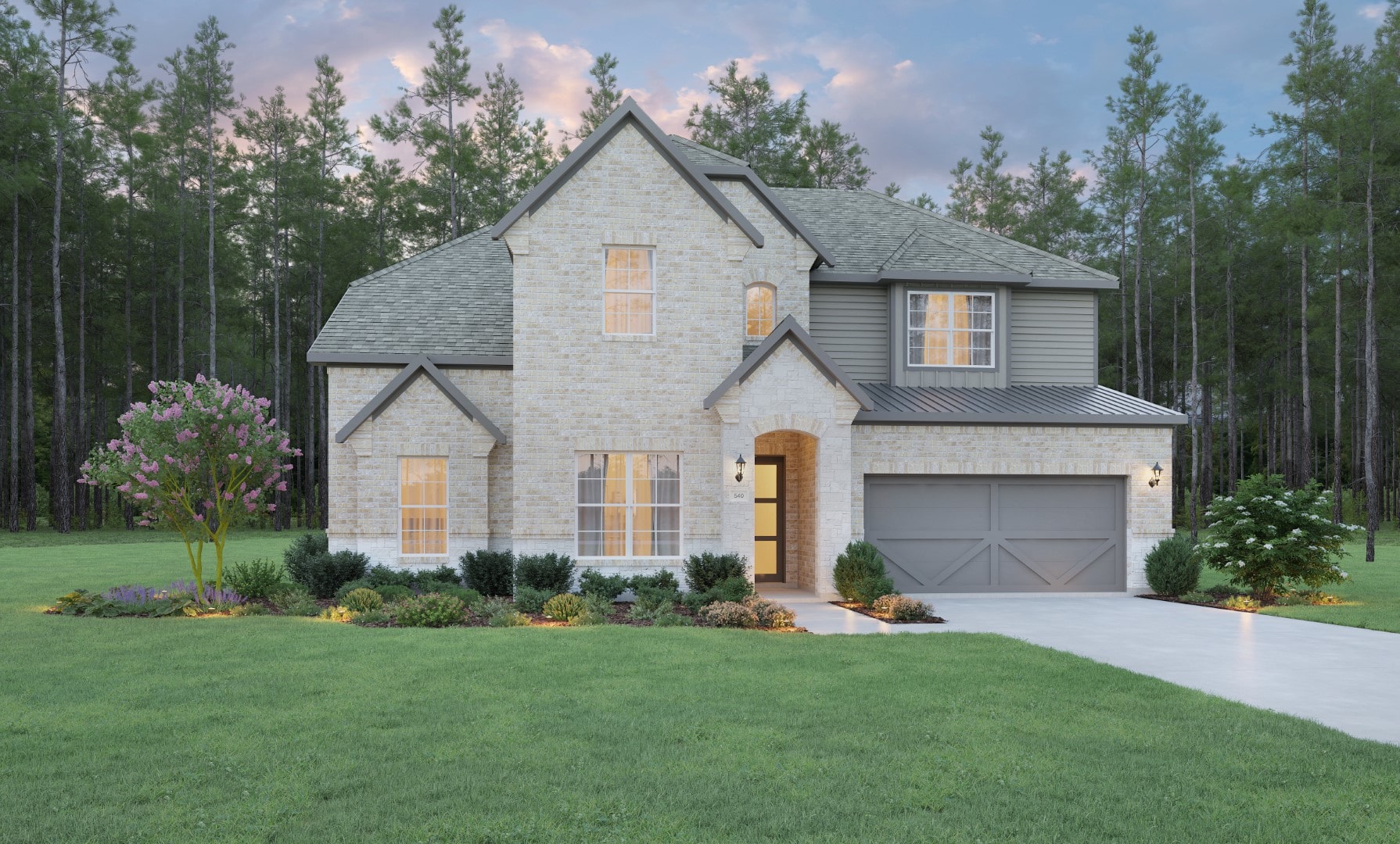 Two-story modern suburban house with light brick exterior, large front windows, and a gray double garage. The house is surrounded by a well-kept lawn, landscaped shrubs, and tall trees in the background.