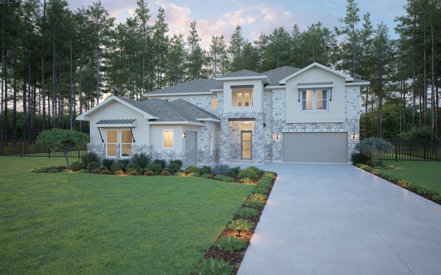Modern two-story house with a brick exterior, large windows, and a two-car garage, surrounded by a well-kept lawn, landscaped bushes, and tall pine trees in the background at sunset.